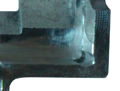 Макро фотография необработанной поверхности гирбокса Super Shooter Aluminum Gearbox